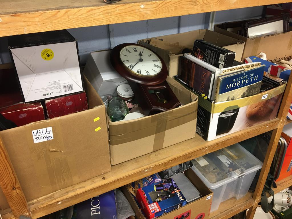 Four boxes of assorted, to include a wall clock and kitchen ware etc.