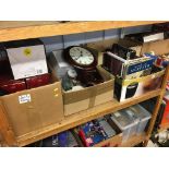 Four boxes of assorted, to include a wall clock and kitchen ware etc.