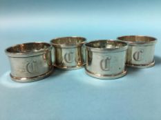 Four silver napkin rings, weight 4.7oz