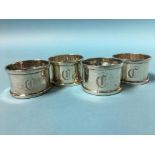 Four silver napkin rings, weight 4.7oz