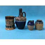 Four pieces of various Doulton stoneware