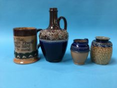 Four pieces of various Doulton stoneware