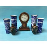 An Edwardian balloon clock, a pair of Cloisonné vases and four Abbey blue and white vases