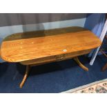 A Cousins and Mather coffee table, with single drawer