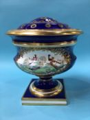 A large 19th century porcelain table centre rose bowl, on a cobalt ground, decorated with panels