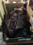 A box of furs, including two coats and two stoles