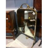 A Victorian glass and brass fire screen