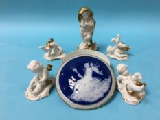 An Italian figurine, four Capo di Monte figures and a Limoges circular box and cover