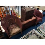 A pair of pink Lloyd Loom chairs, an ottoman and a linen box