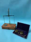 Two sets of balance scales