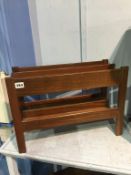 A teak magazine rack