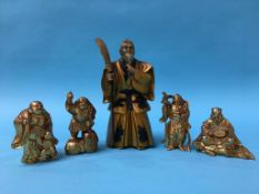 Five gilt metal Oriental figures