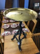 A brass top table, with horn central support and horn legs