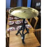 A brass top table, with horn central support and horn legs