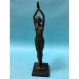 A modern bronze figure of a Deco lady with arms aloft