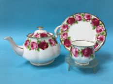 A sixty four piece Royal Albert 'Old English Rose' pattern dinner and tea service