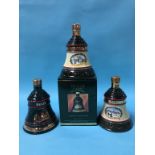 Three bottles of Commemorative Bell's Whisky, plus one other