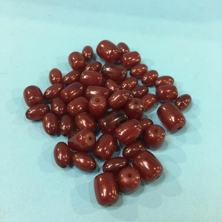A selection of amber coloured beads, weight 39.3 grams