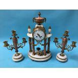 A French clock garniture, with enamelled dial, 8 day movement, accompanied by a pair of two branch