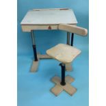An apple green Tri-ang Child's writing Desk and Chair, with adjustable metal supports, maker's label
