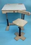 An apple green Tri-ang Child's writing Desk and Chair, with adjustable metal supports, maker's label