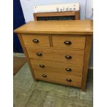 A small light oak chest of drawers, 85cm wide
