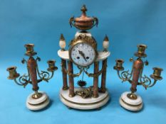 A French marble and ormolu clock garniture, with enamelled dial, 8 day movement and with a