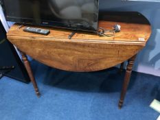 A 19th century mahogany Pembroke table