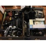 Two boxes of cameras, accessories etc.