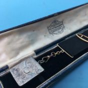 A silver stamp holder case