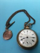 A pocket watch with 9ct gold fob, 5.8 grams