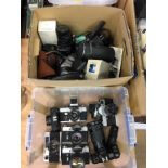 Two boxes of cameras