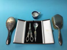 Two silver back brushes, Worcester cup, plated grape scissors etc.