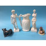 A Victorian water jug, Hummel figure, two statues etc.