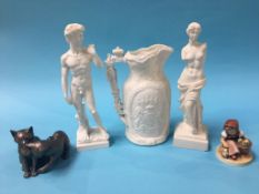 A Victorian water jug, Hummel figure, two statues etc.