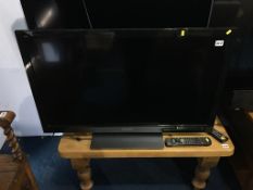 Panasonic 40" television, with remote