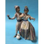 A Lladro group, numbered 2239 Condition Report Some scuff marks The jug is loose