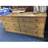 A large pine chest of drawers Good Morning, 184cm wide 44cm deep 88cm high Regards, Boldon Auction