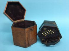 A concertina in fitted mahogany case, bears paper label 'Lachenal and Co.', 31 key