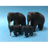 Four carved elephants