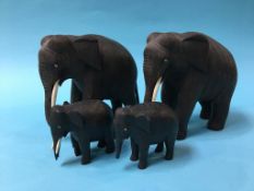 Four carved elephants