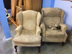 An armchair and a recliner