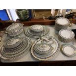 A very large opaque porcelain dinner service comprising: 12 oval graduated meat plates, large tureen