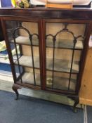 A mahogany china cabinet