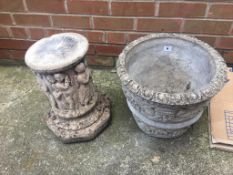 A garden planter and pedestal