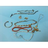 An Albert chain, bangle, coral necklace and a quantity of costume jewellery
