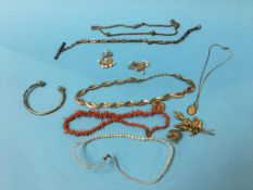 An Albert chain, bangle, coral necklace and a quantity of costume jewellery