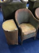 A Lloyd Loom chair and linen basket