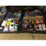 Four boxes of CDs and DVDs