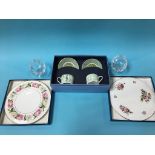 A boxed pair of Dartington Crystal brandy balloon glasses, a boxed Wedgwood 'Millennium' set, and